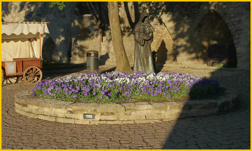 Flowers and Statue
